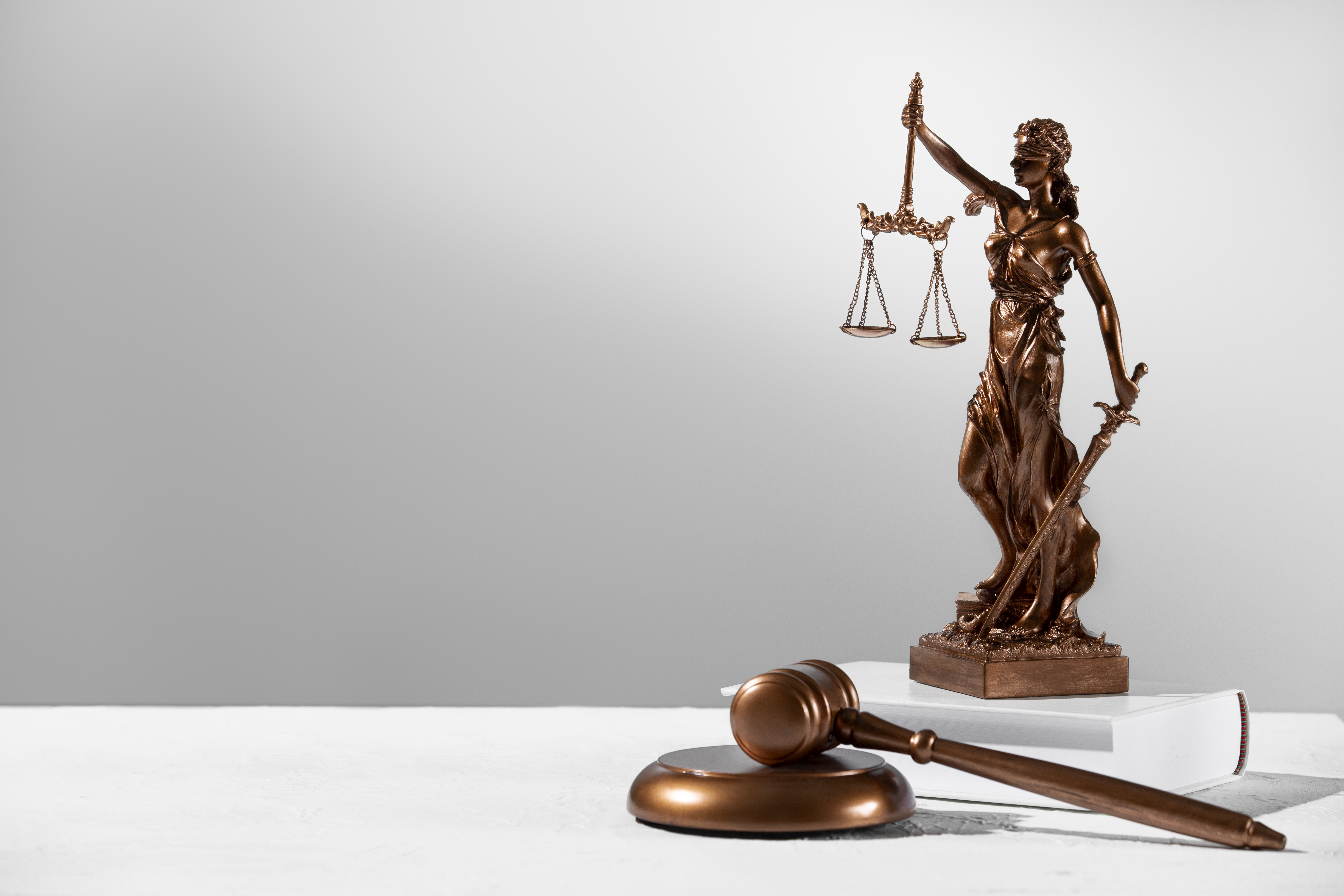 Statuette of Lady Justice with scales and sword