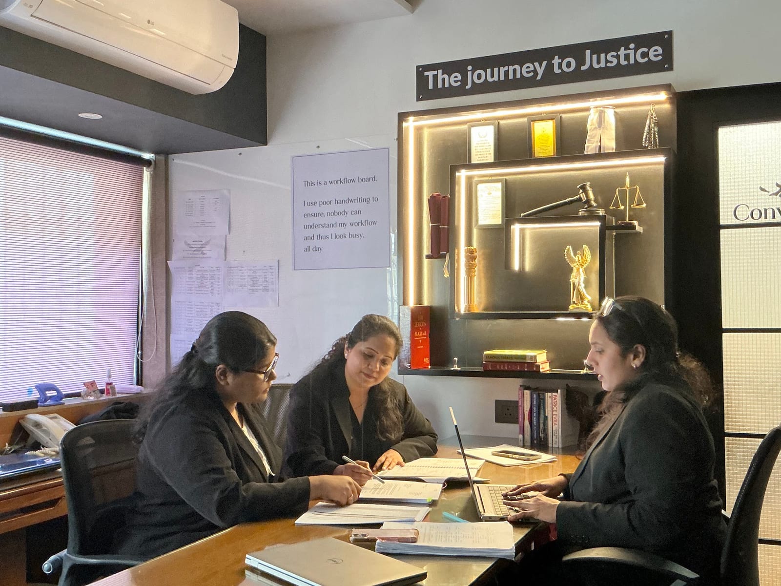 Lawyers at Eagle Law & Integrity reviewing a client matter