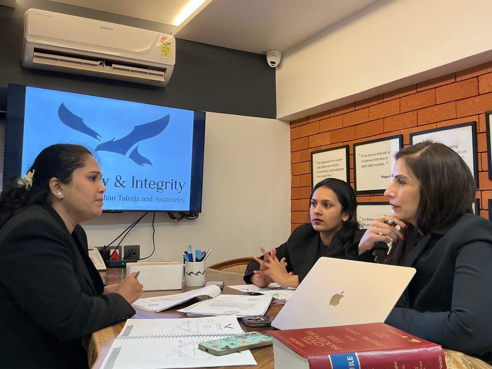 Lawyers collaborating at Eagle Law & Integrity